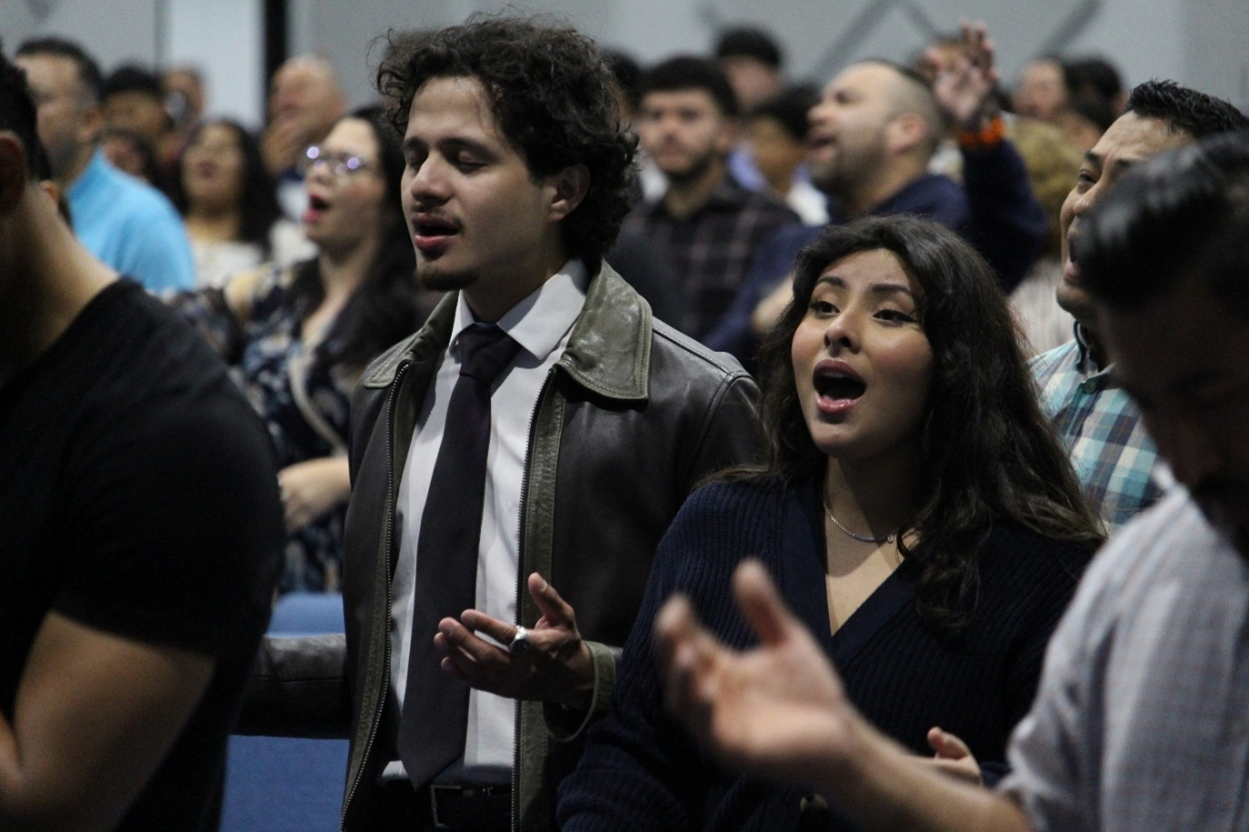 A paper cut out of a family holding hands