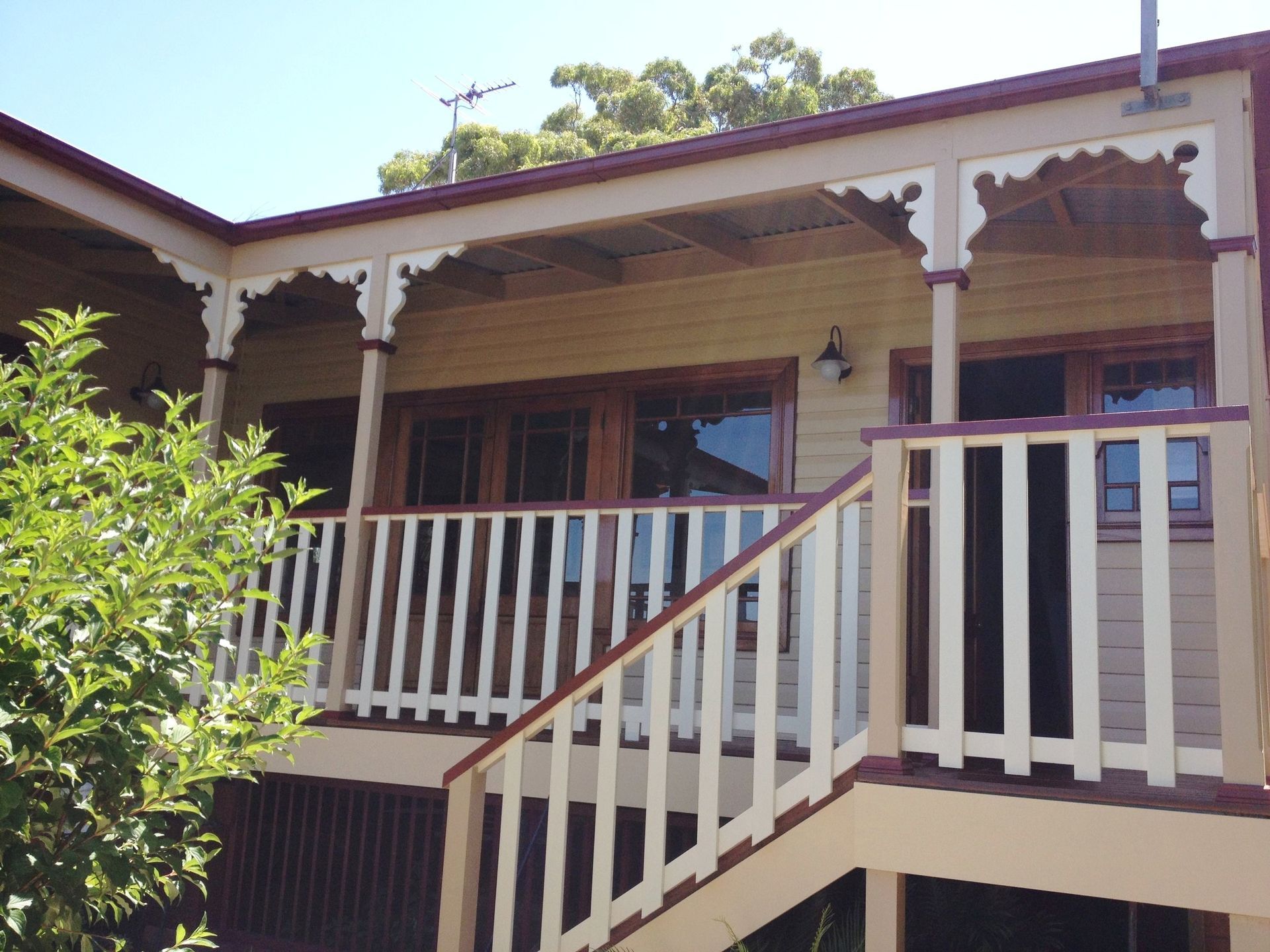 House With A Porch And Stairs Leading Up To It — CPAINT in Forster, NSW
