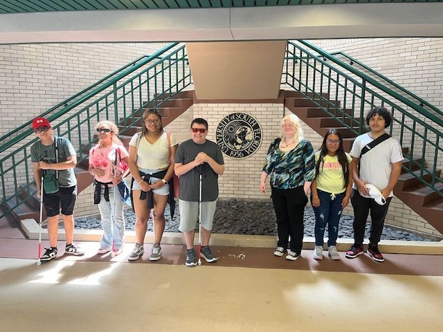 a group of teens posing for a picture at USF