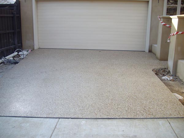 garage with new driveway