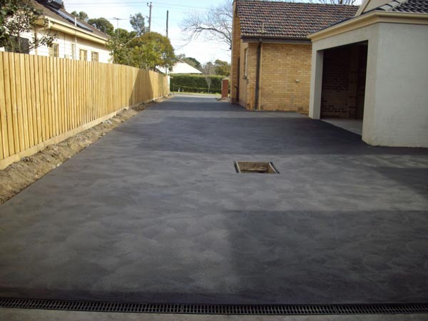 house with concrete driveway