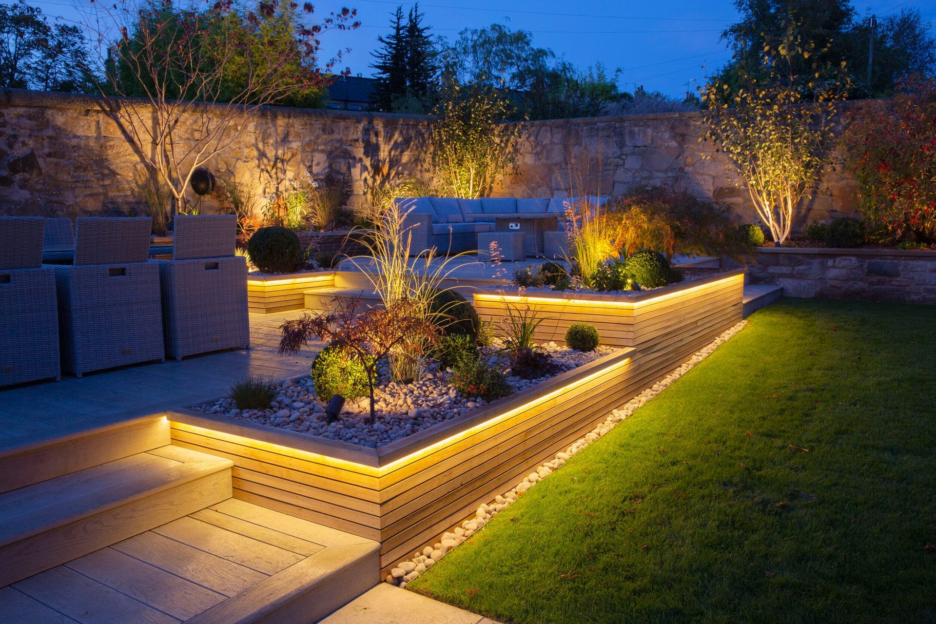 An illuminated deck at night, softly glowing with warm, inviting light, casting a gentle and serene ambiance.