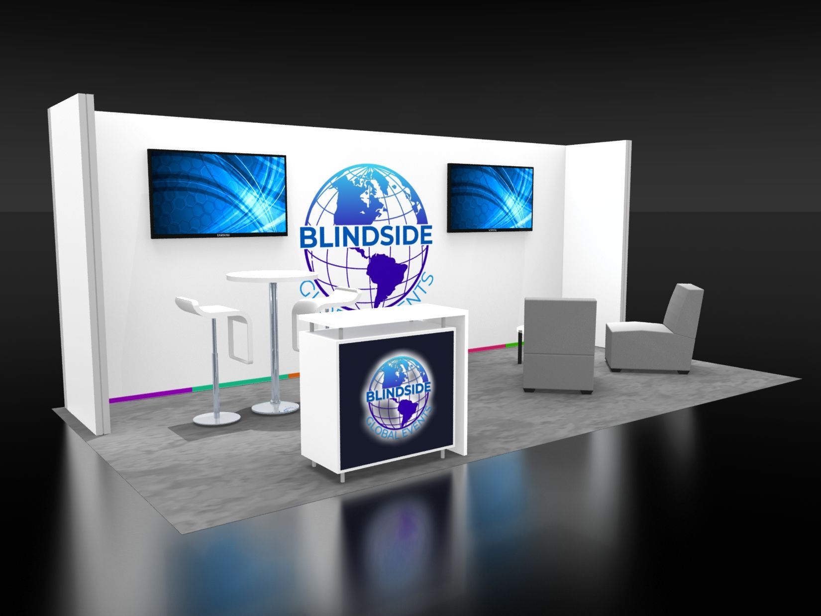 Trade show booth with white walls, two TVs, logo, seating, and a registration counter.