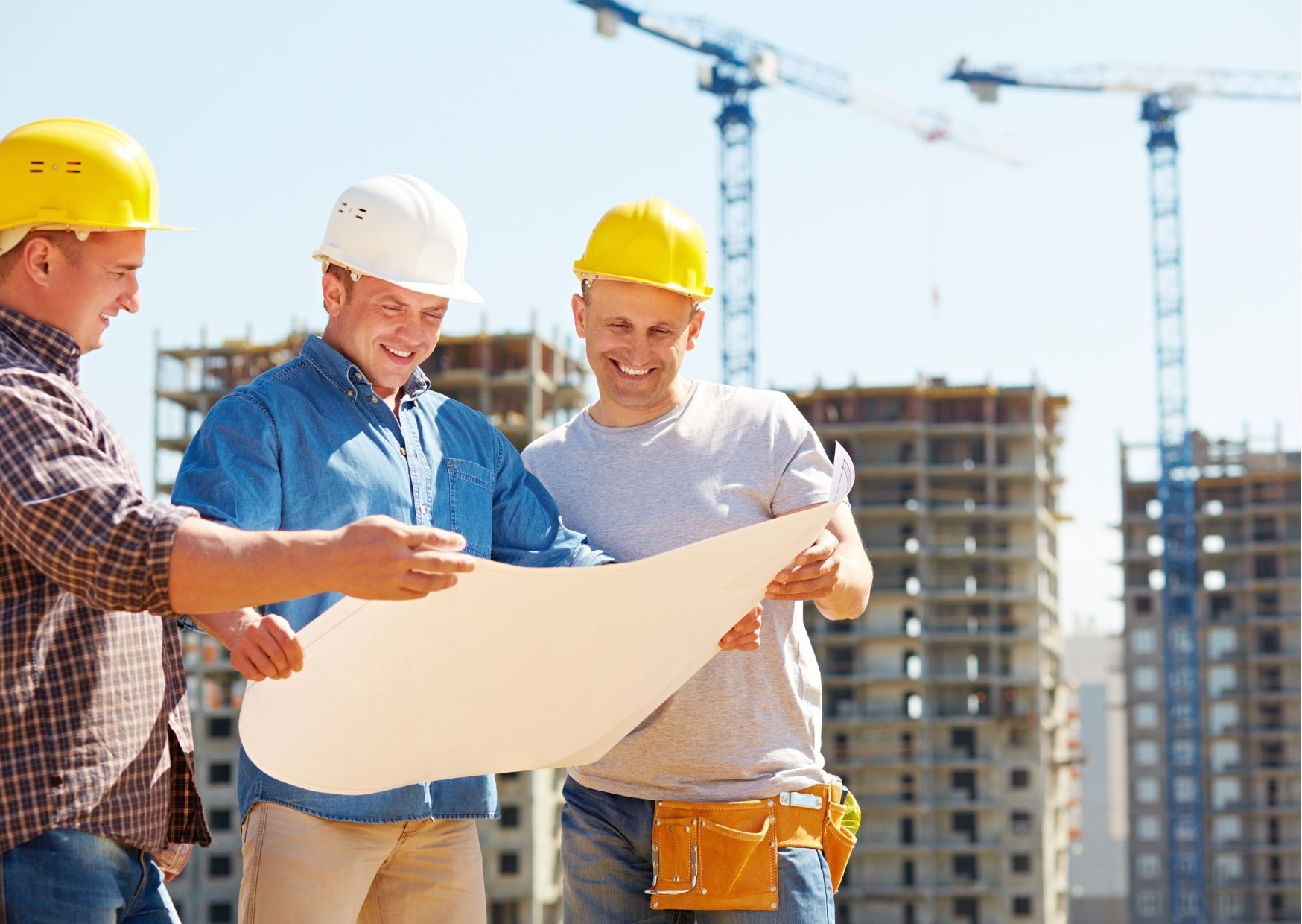 A parking lot with a yellow building in the background