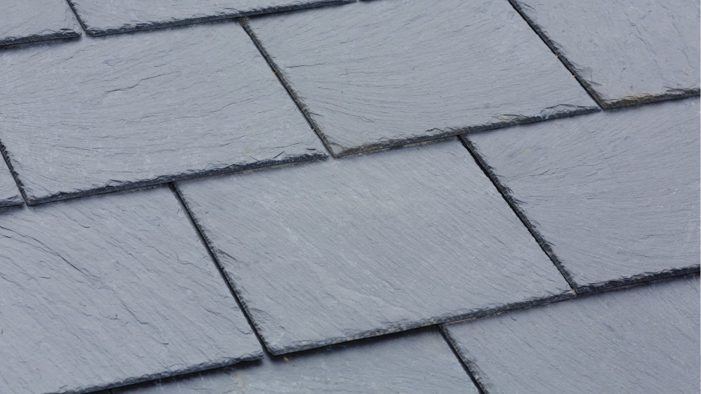 Dark gray slate roof tiles.