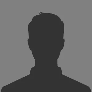 A silhouette of a man 's head on a gray background.