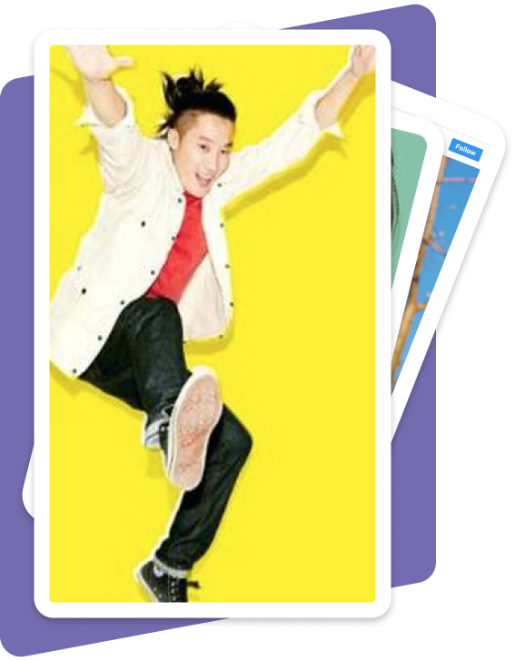Male youth jumping and smiling a camera on yellow background