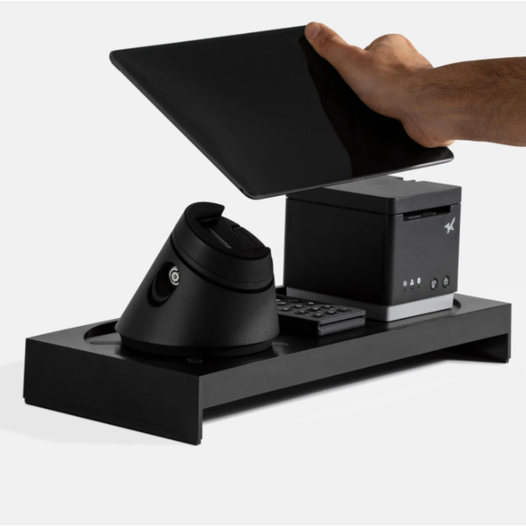 A person is holding a tablet in their hand