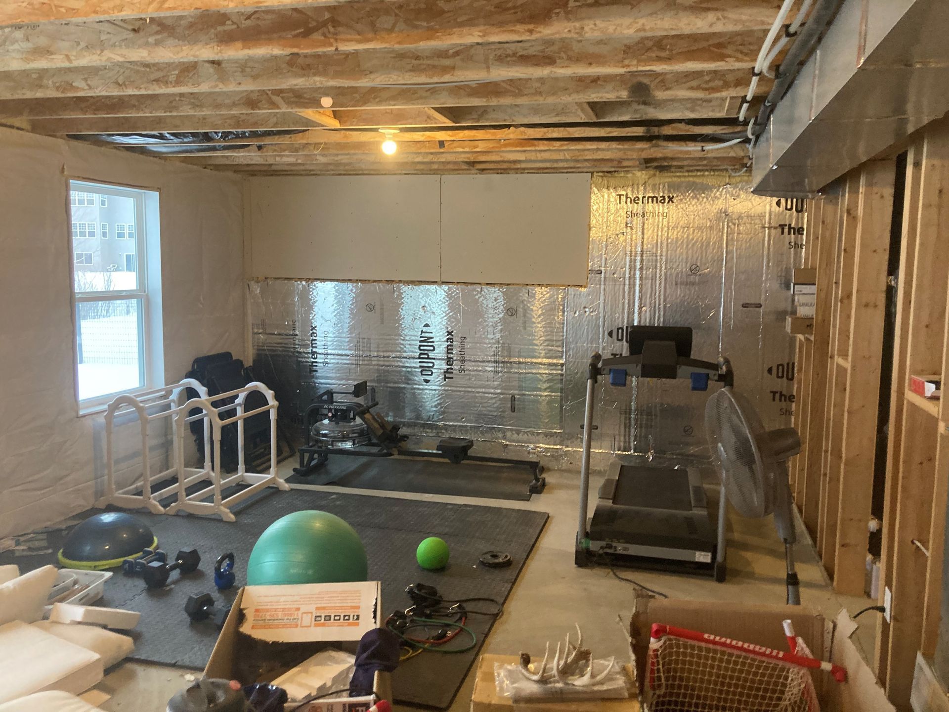 Room with Gym Equipment — Buffalo, MN — Hancock Home Improvements