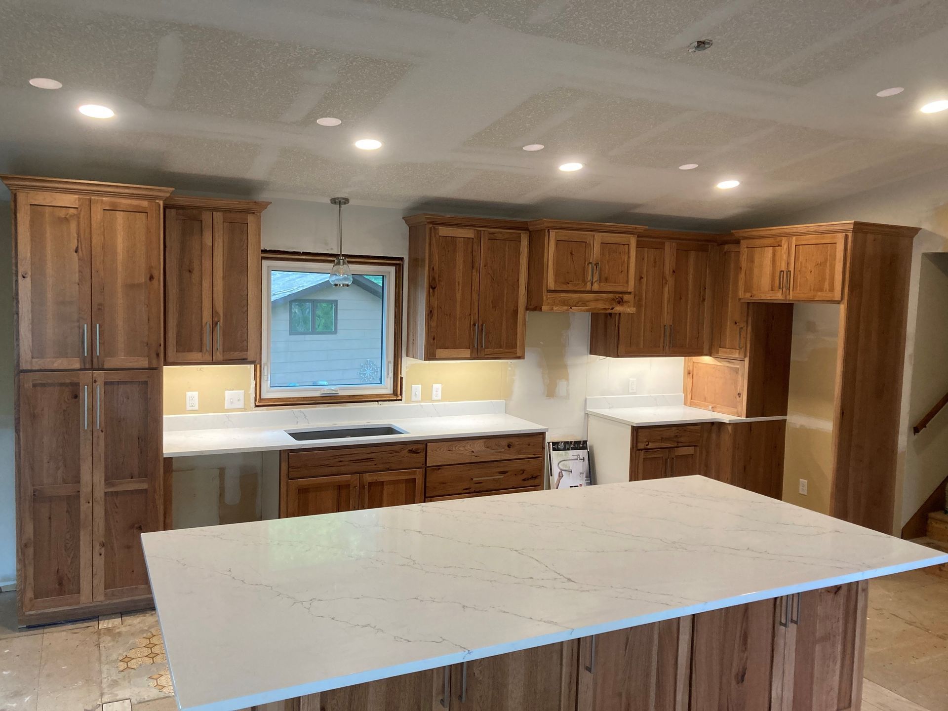 Kitchen with Countertop Table — Buffalo, MN — Hancock Home Improvements