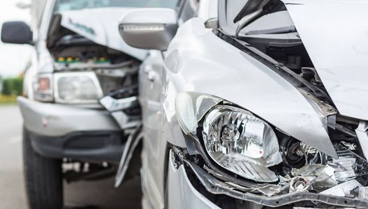 A close up of a car that has been damaged in an accident.