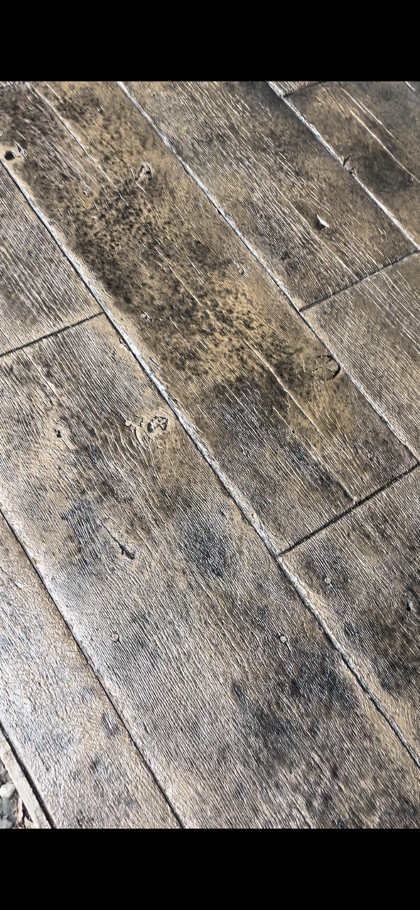Close-up of gray and brown textured wooden planks.