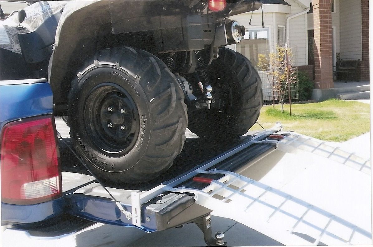 ATV loaded with a Clamp a Ramp - Ramp Safety Bar