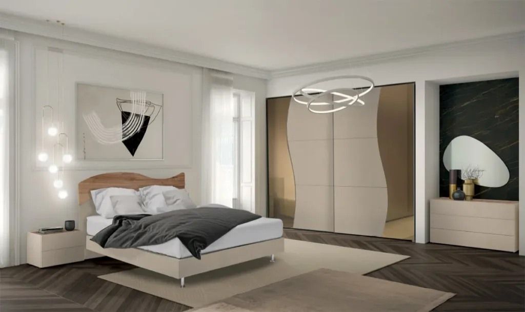 camera con letto, comodino, cassettiera e armadio