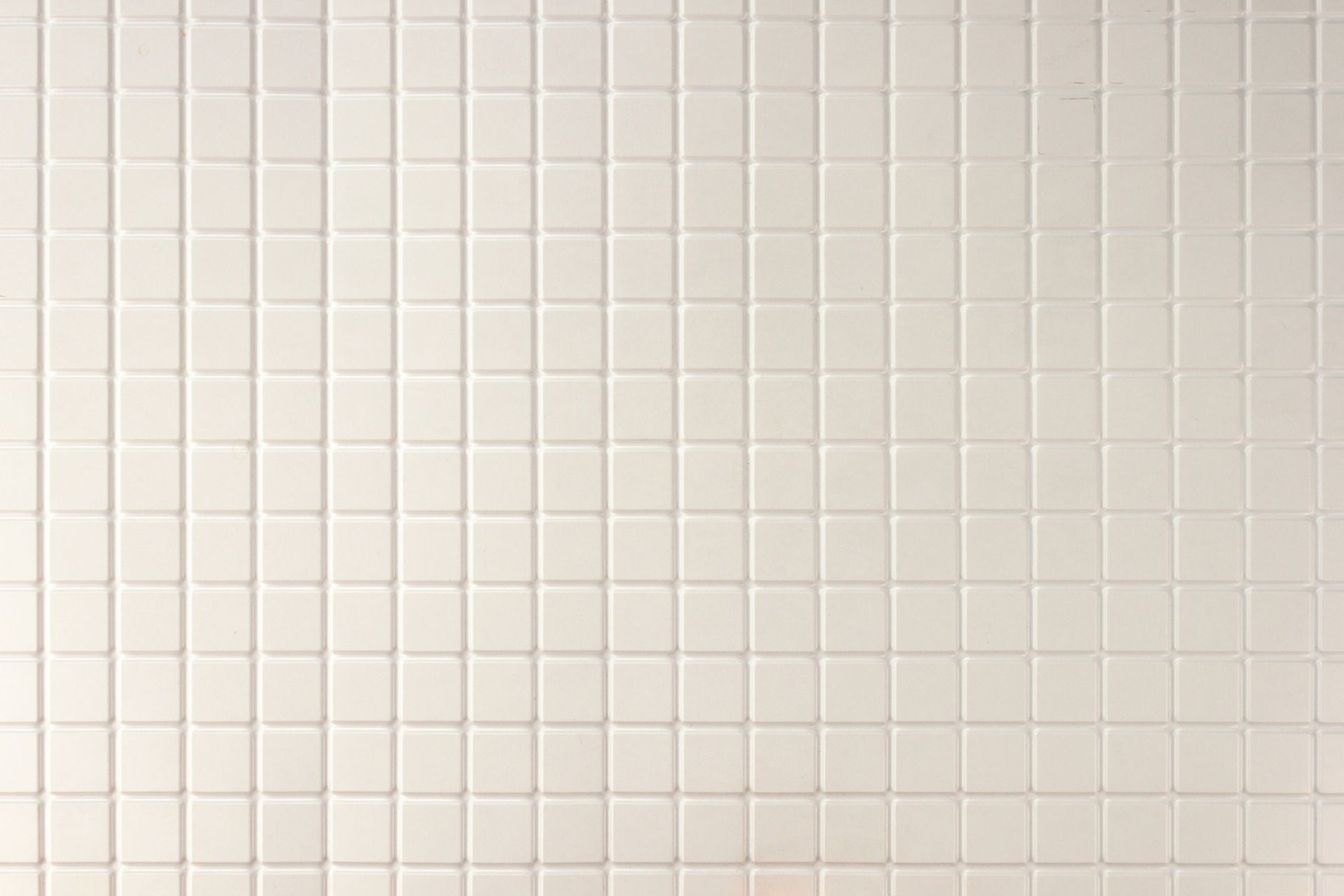 White square tile wall.