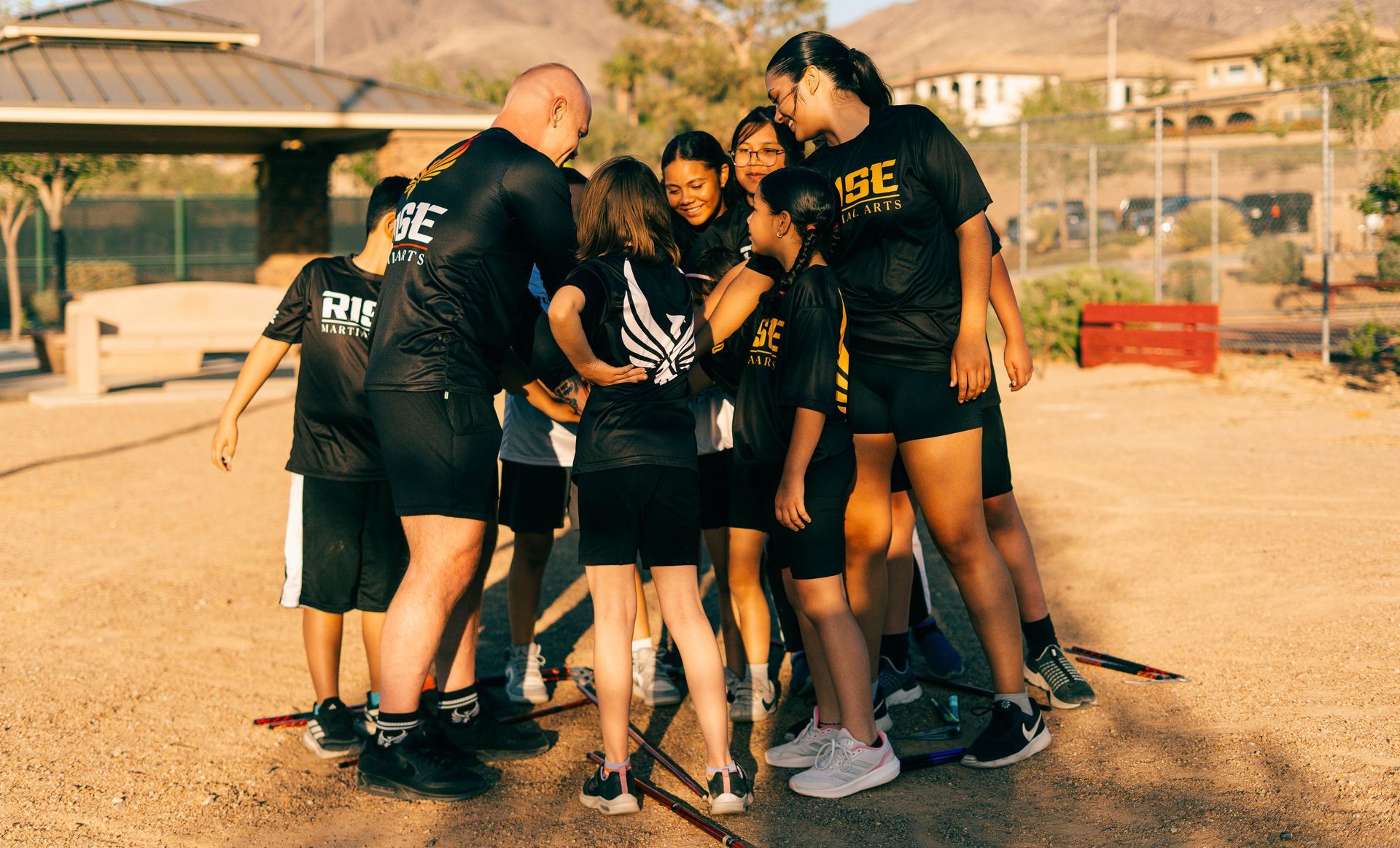 An aerial view of a city skyline at sunset.
