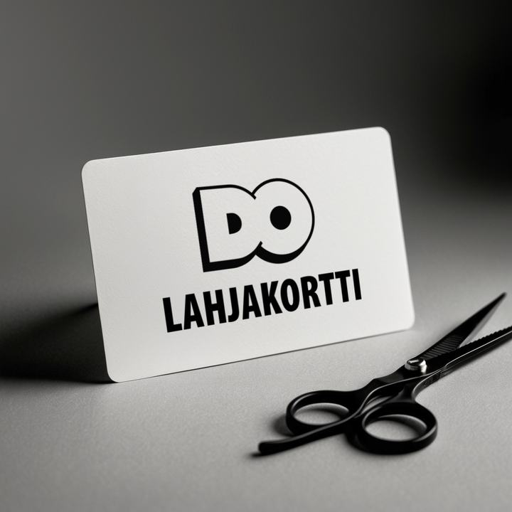 A white card that says do lahjakortti next to a pair of scissors