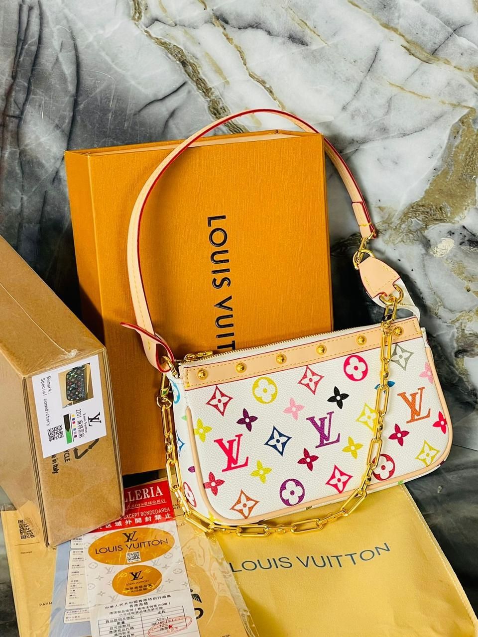 LV x TM  CARTERA POCHETTE