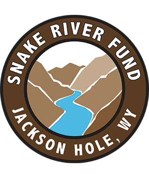 Snake River Fund circular logo with mountains and river, Jackson Hole, WY text