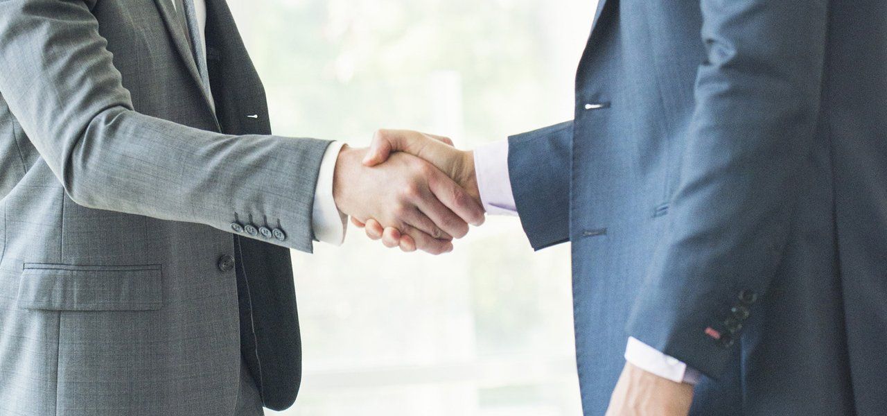 Men handshaking