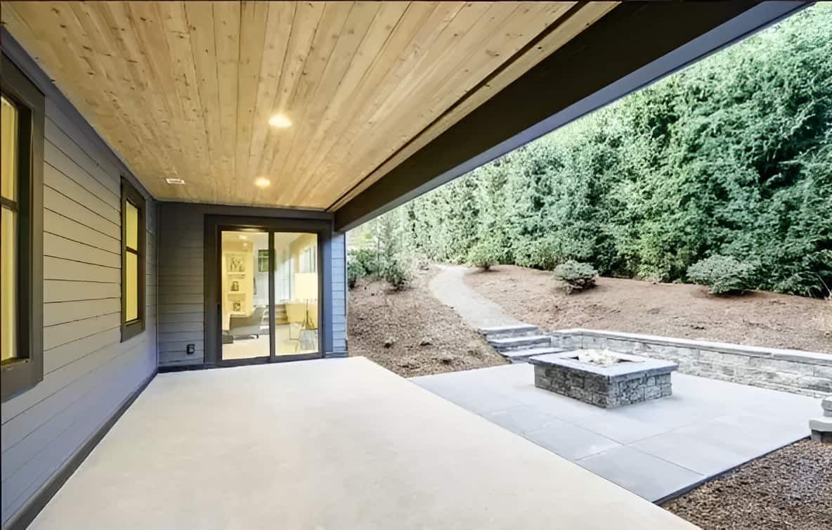 There Is A Fire Pit In The Backyard Of The House — S & K Gallaway Concreting In West Mackay, QLD