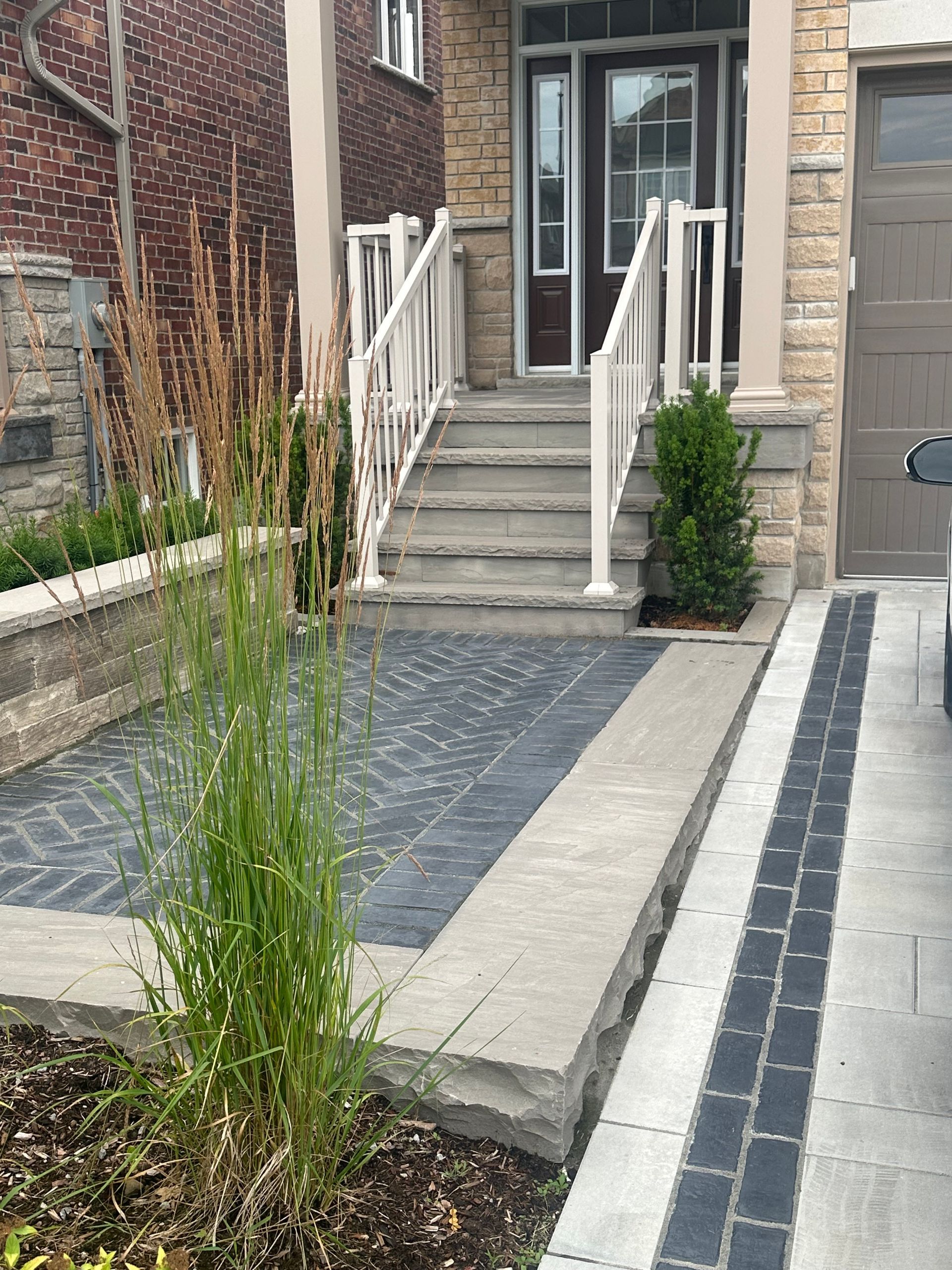 A house with stairs leading up to the front door