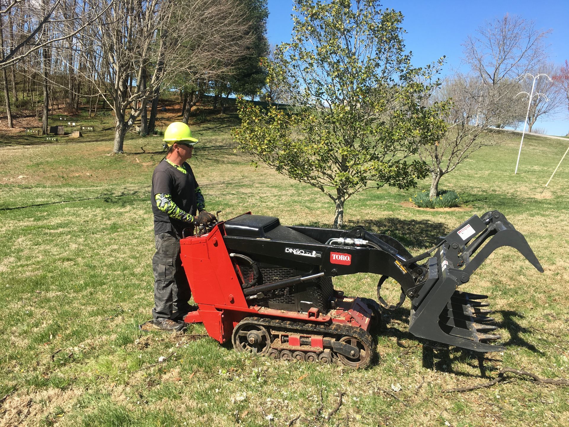 Man Operating Mini Bucket — Campbellsville, KY — Ray's Tree Service LLC