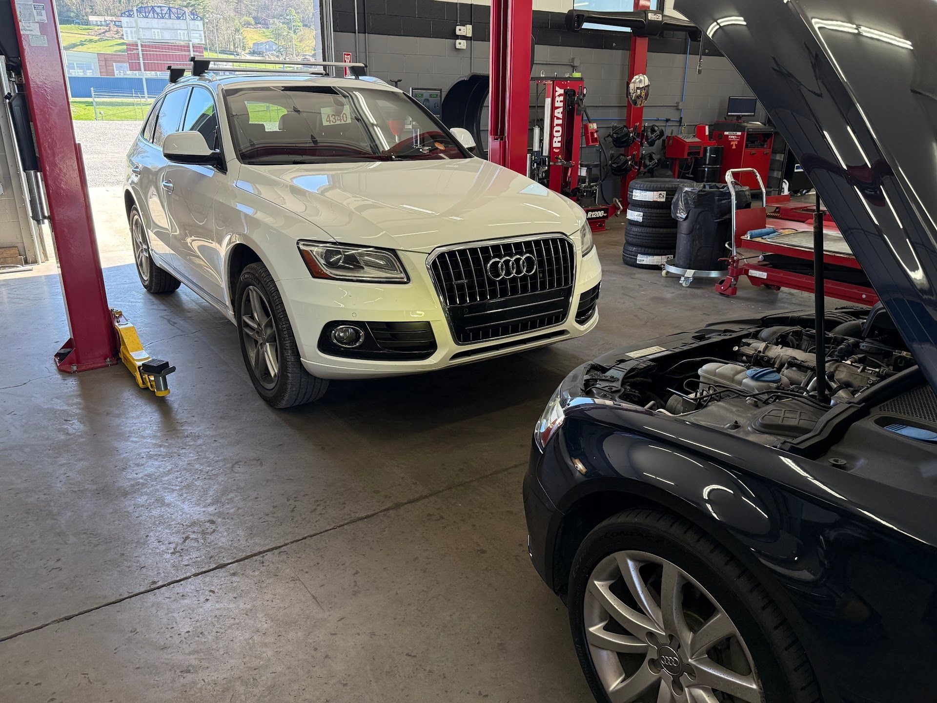 European Auto Repair Shop Interior With Vehicles In Service | Eurotech Knoxville