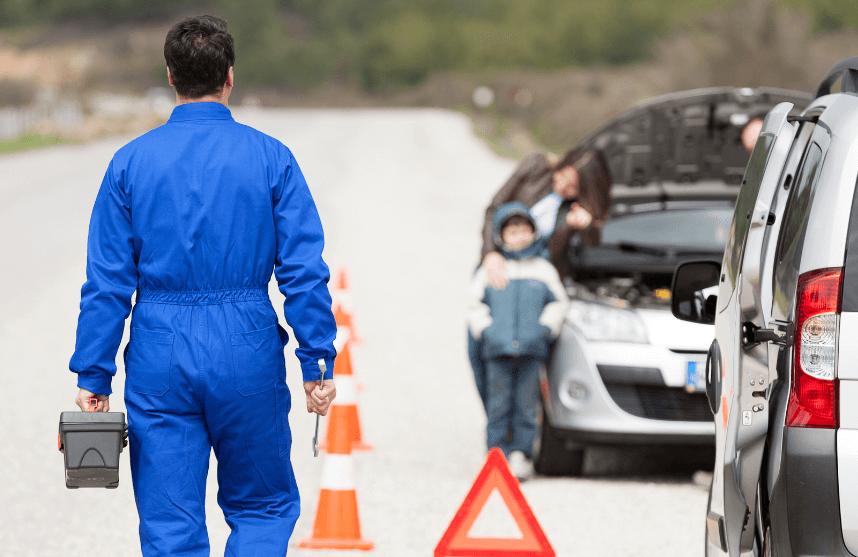 A mobile mechanic helping a stranded family
