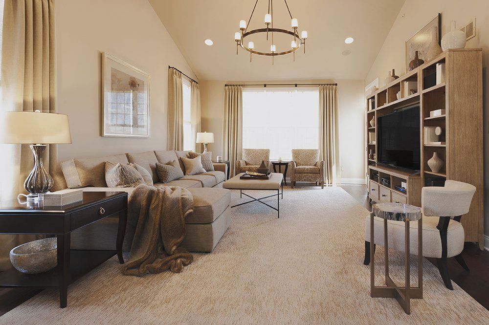 A living room with a couch and a television