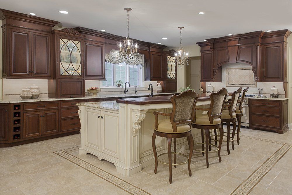 A kitchen with a large island in the middle