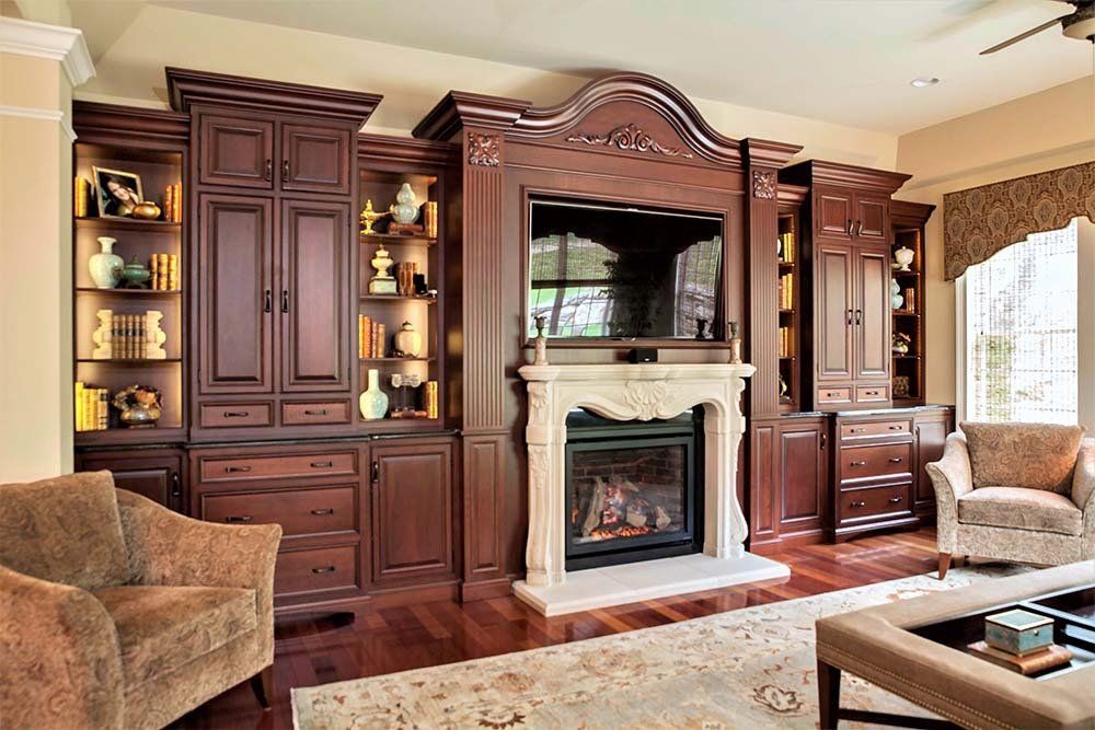 A living room filled with furniture and a fireplace