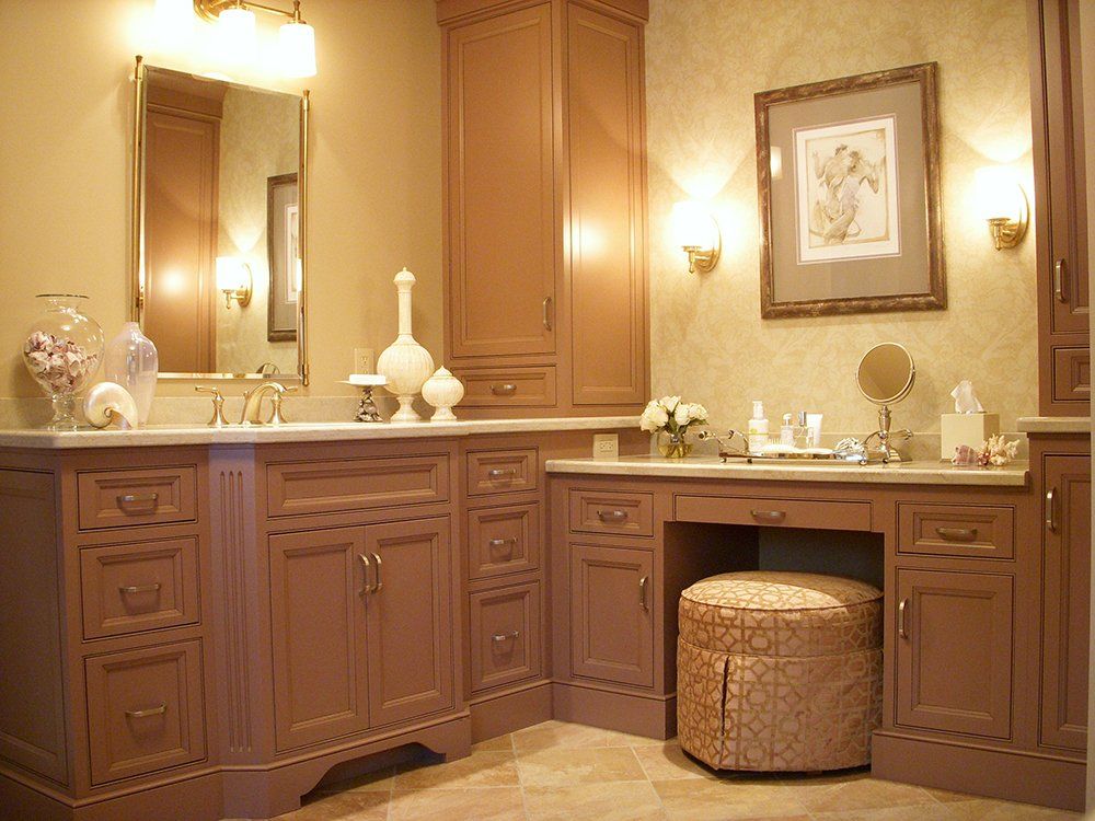 A bathroom with two sinks and a mirror
