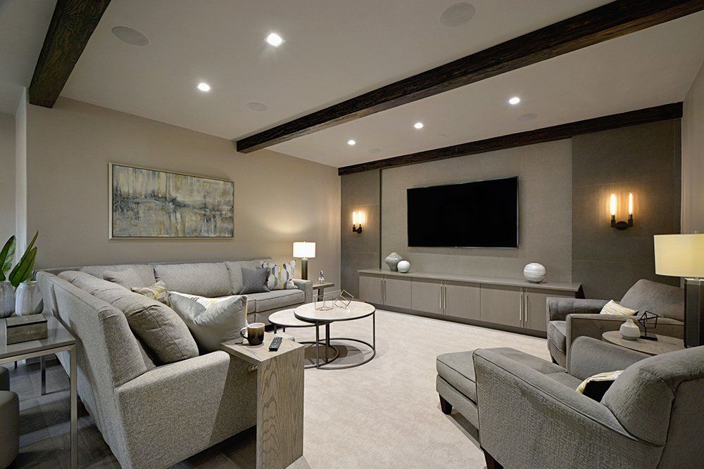 A living room filled with furniture and a flat screen tv