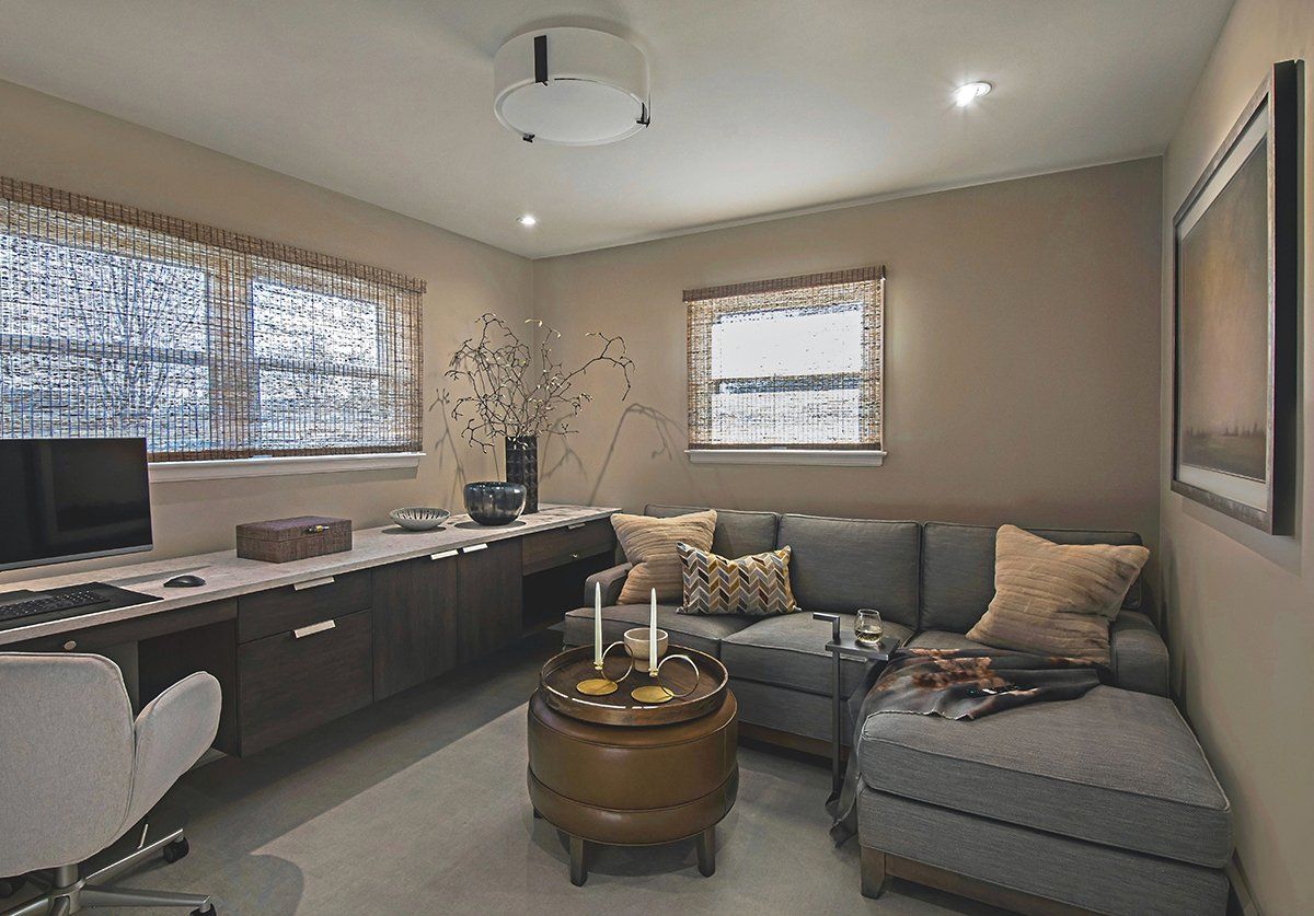 A living room with a couch and a coffee table