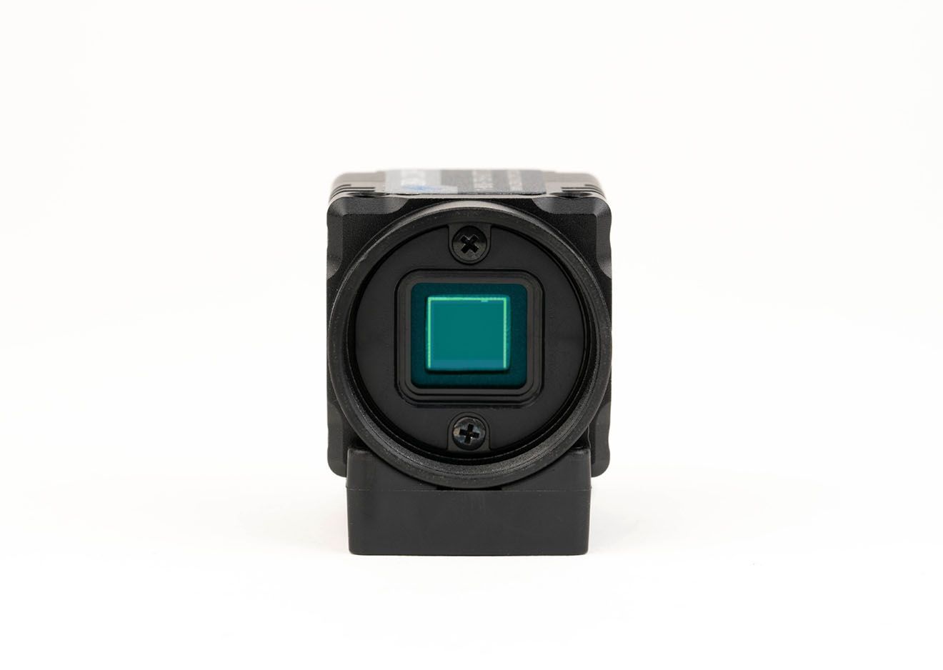 A black camera with a green square in the middle on a white background.