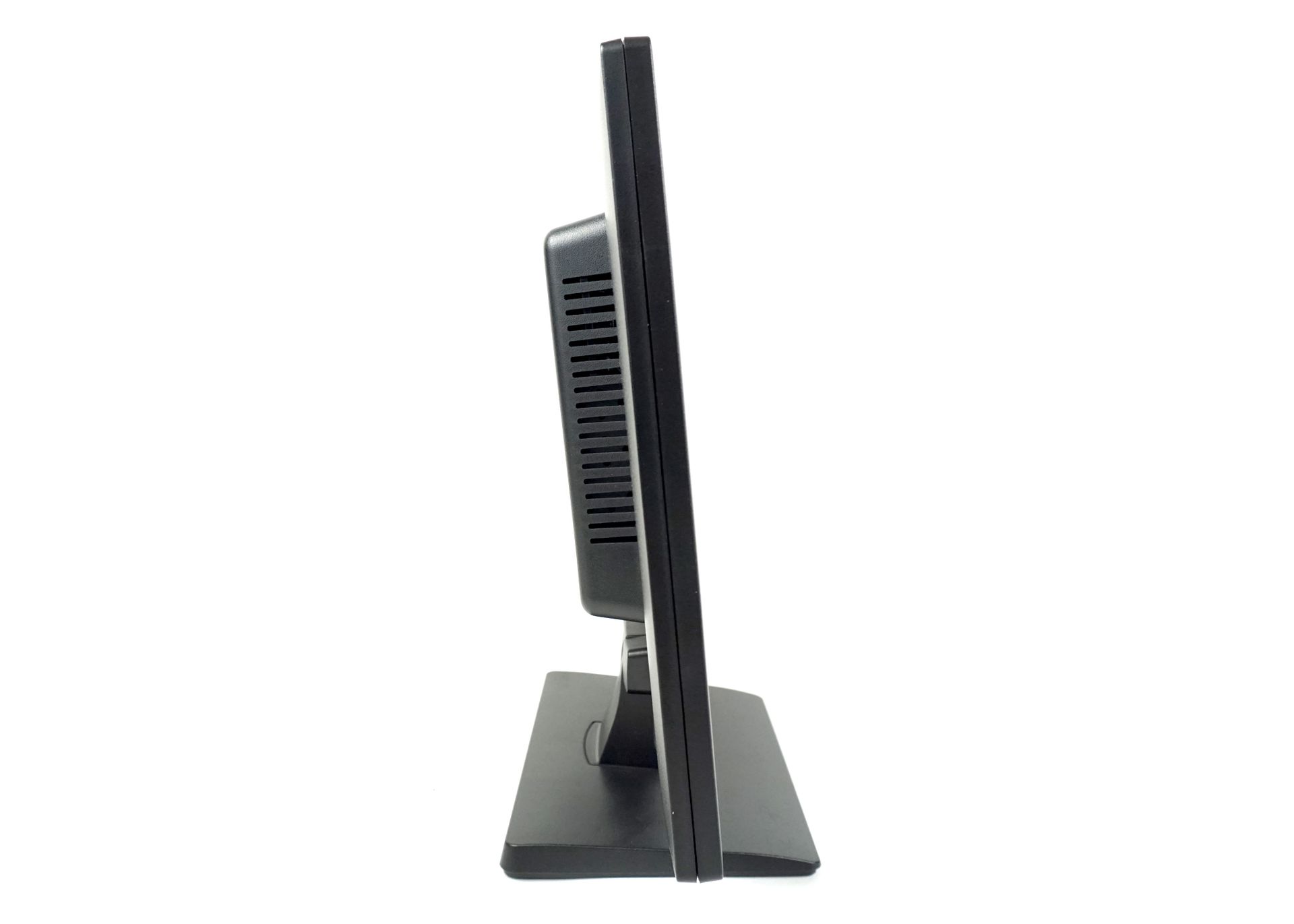 A computer monitor is sitting on a stand on a white background.