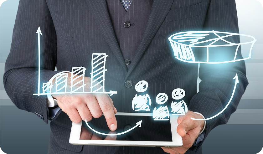 A man in a suit is holding a tablet with a graph on it.