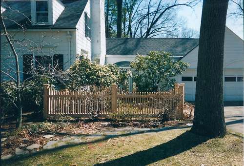 Wood Fence with Tree—  Fences in Springfield, MA
