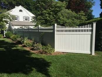 Vinyl Fence within Part of the House — Fences in Springfield, MA
