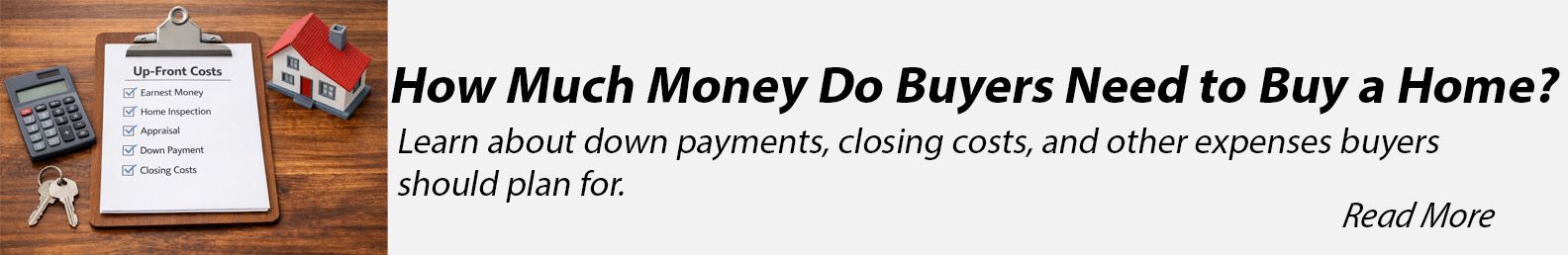 Calculator and house keys on top of financial documents