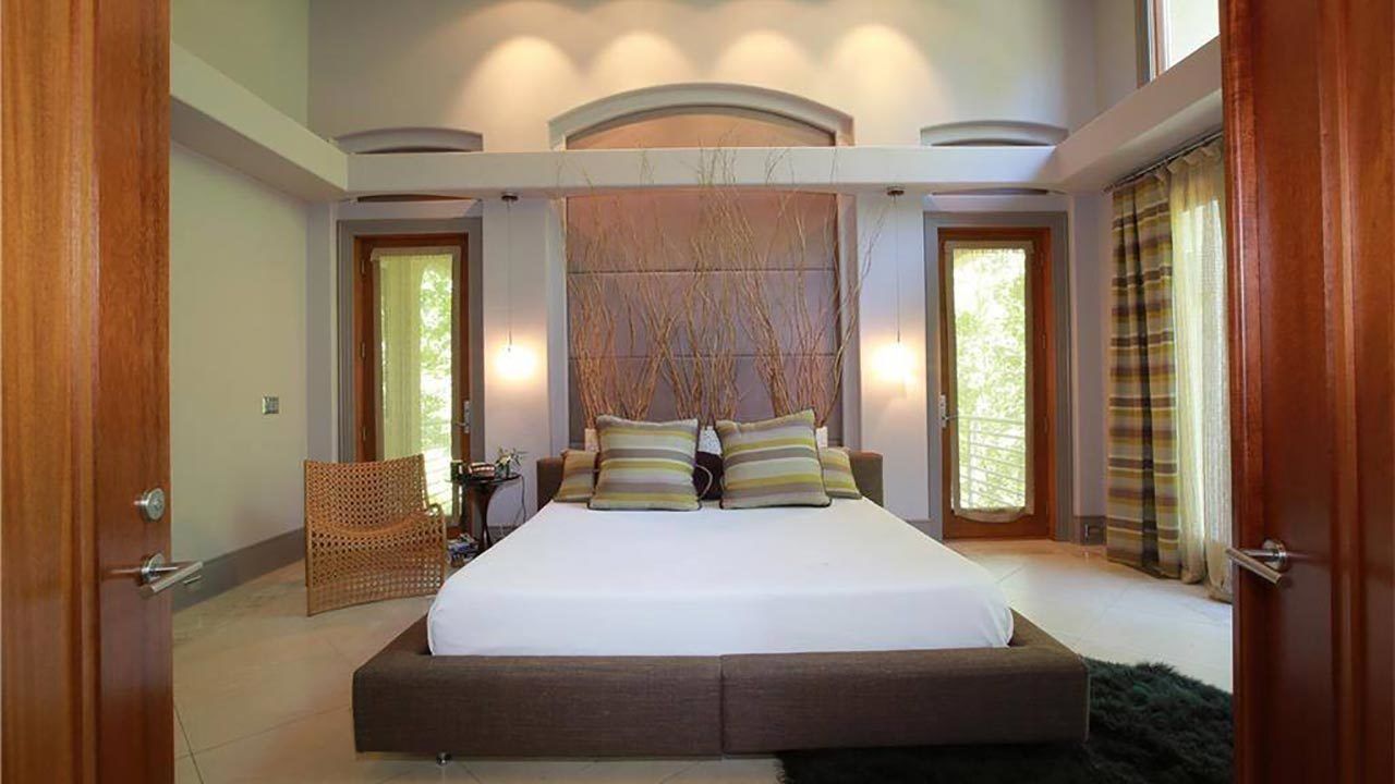 There is a large bed in the middle of the room.