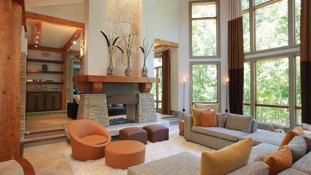A living room filled with furniture and a fireplace.
