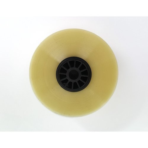 A close up of a skateboard wheel on a white surface.
