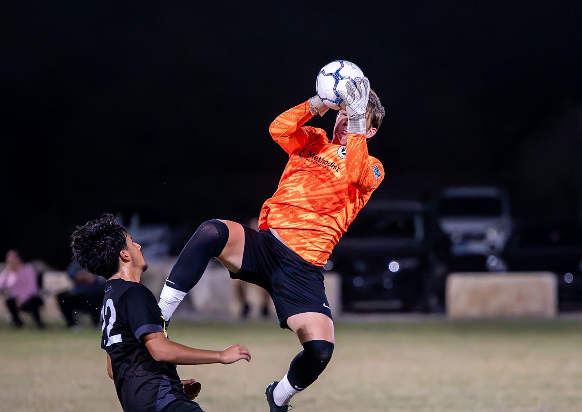 A goalkeeper catching the ball for San Antonio City Soccer Club