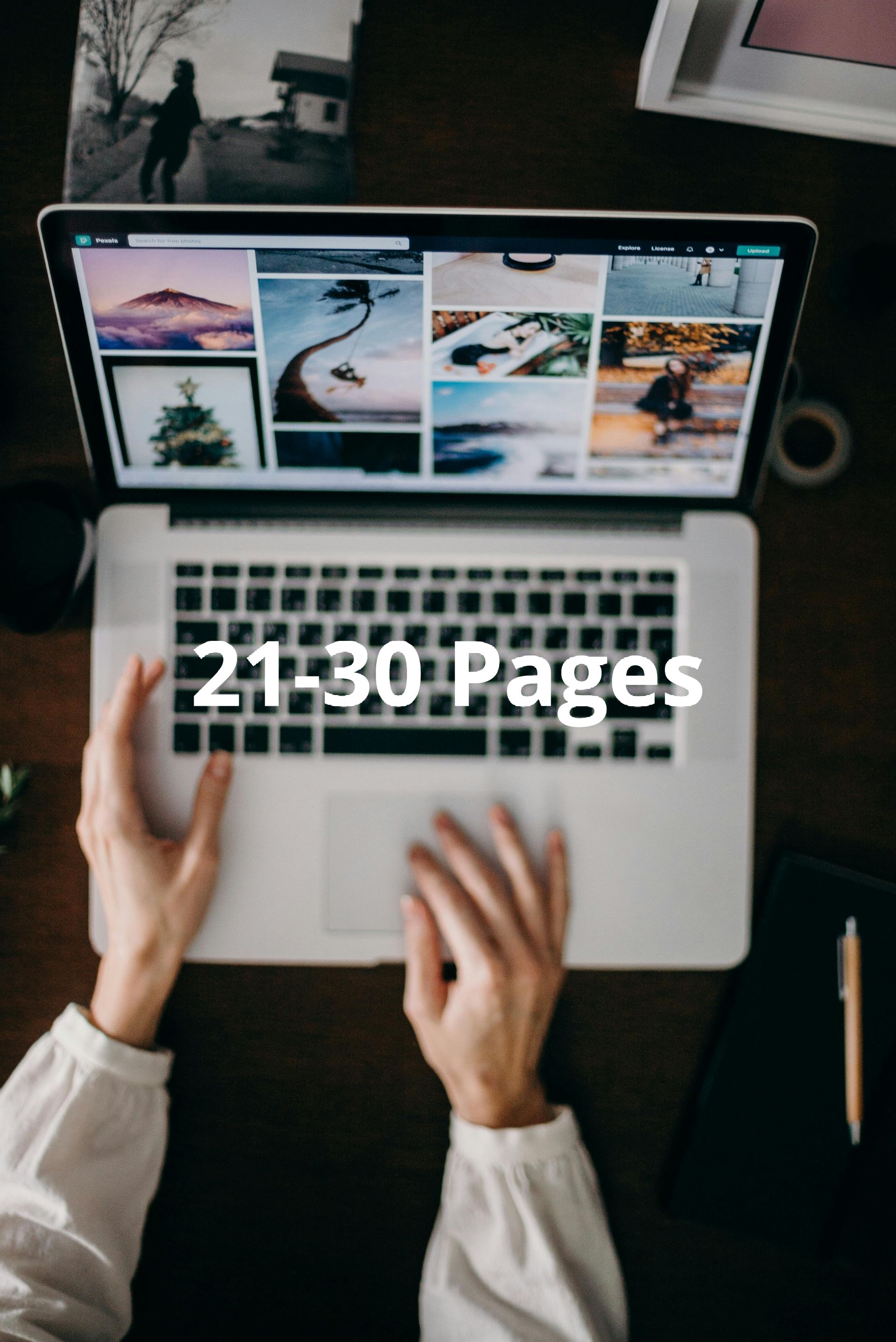 A person is typing on a laptop with the words 21-30 pages below them