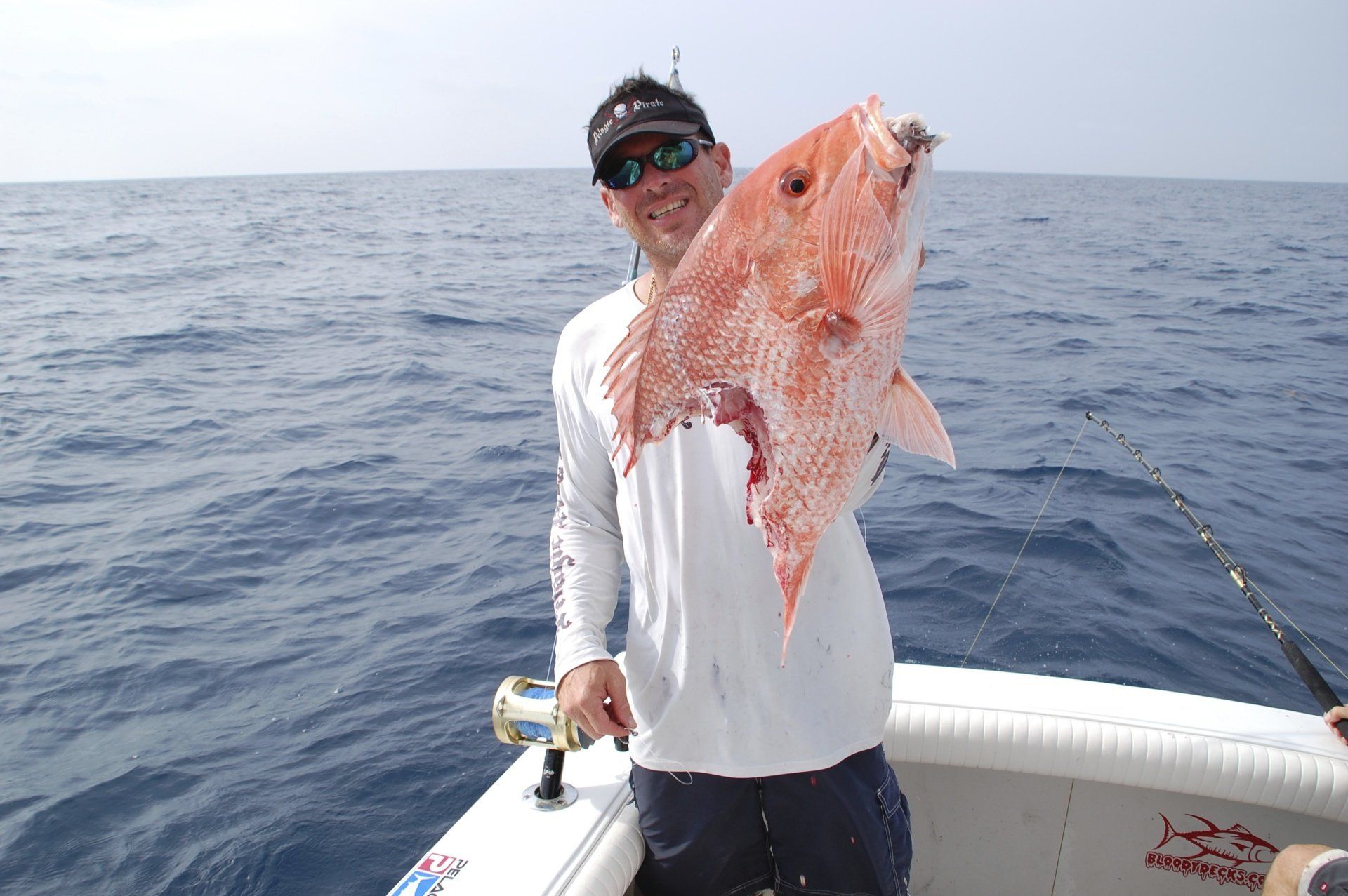 Red snapper with a bite taken out of it
