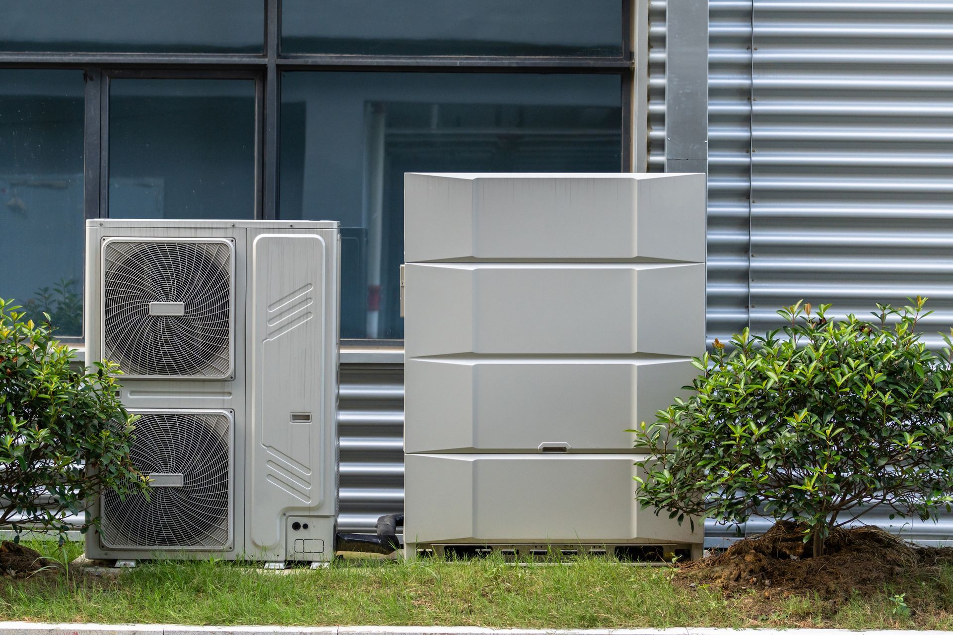 A building with a stack of boxes on the side of it