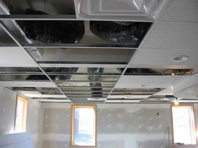 A room with a ceiling that is being remodeled.