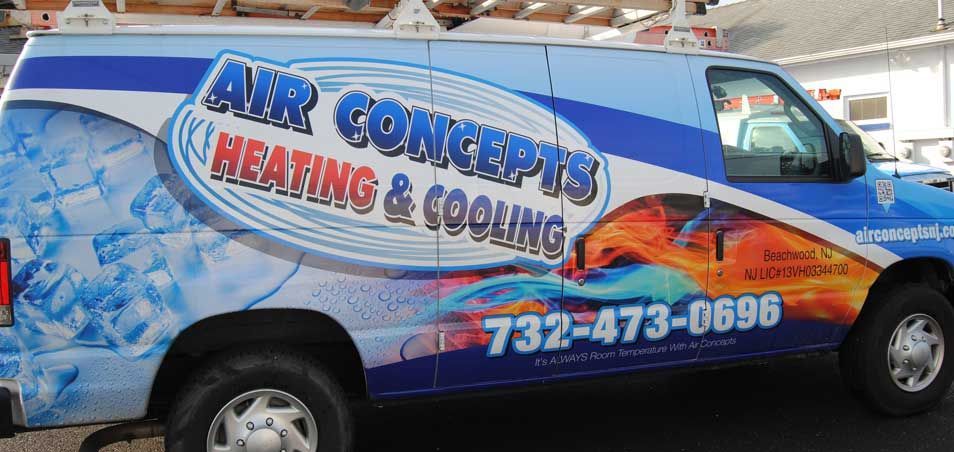 A van that says air concepts heating and cooling on it